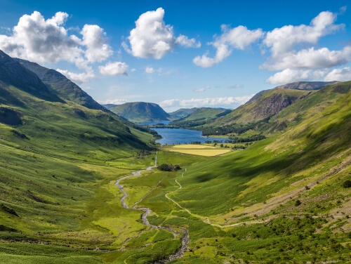 Sky view of the Cumbria Way walk in the Lake District with miles of greenery and water