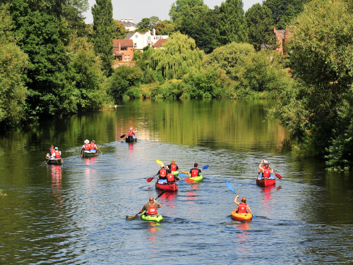 Water activities in the Lake District - A group of people kayaking